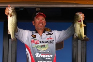 Stephen Browning with two Red River Bass that put him in the "green'"
