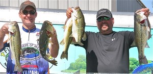 Eric Evans, right, gets help from tournament director Brent Crawford holding up his winning catch!