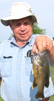 Tommy with a nice hybrid bream