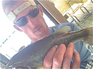 Jason Williams shows off the tagged fish that put him in the running for some major prizes!