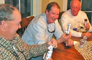 Neal DeForest, right, Joey Young and Dan Turner enjoy an ice cream sandwich.