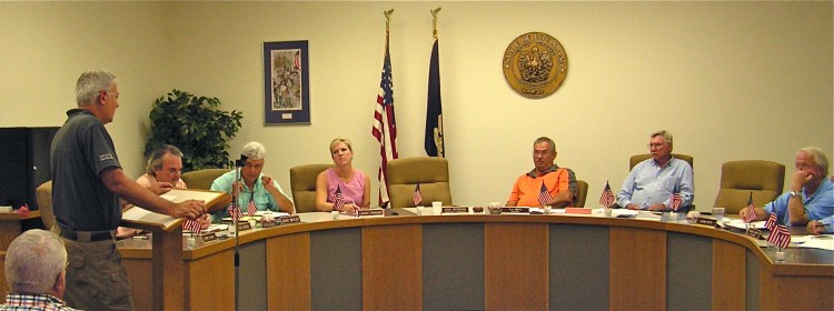 Mike Wood talks to the D'Arbonne Lake Commission Monday night about recent bass study results.