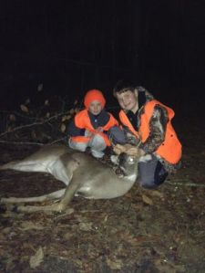 Michael Jones with one of his Holiday deer -- a four point!