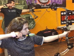 Ann-Elise practices with her dad