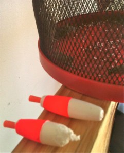 The bottom cork shows where crickets chewed on it. The top one was the only "survivor" of four...You can actually see little white "dots" of styofoam in the bottom of the box...